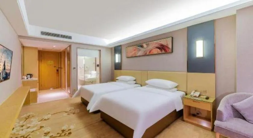 Bed in Vienna Hotel Guangdong Zhongshan Xiaolan High-Speed Railway Station