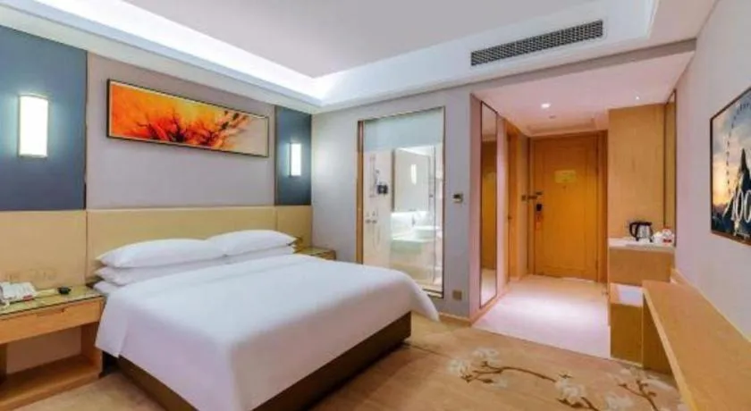 Bed in Vienna Hotel Guangdong Zhongshan Xiaolan High-Speed Railway Station