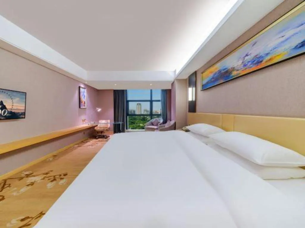 Bed in Vienna Hotel Guangdong Zhongshan Xiaolan High-Speed Railway Station