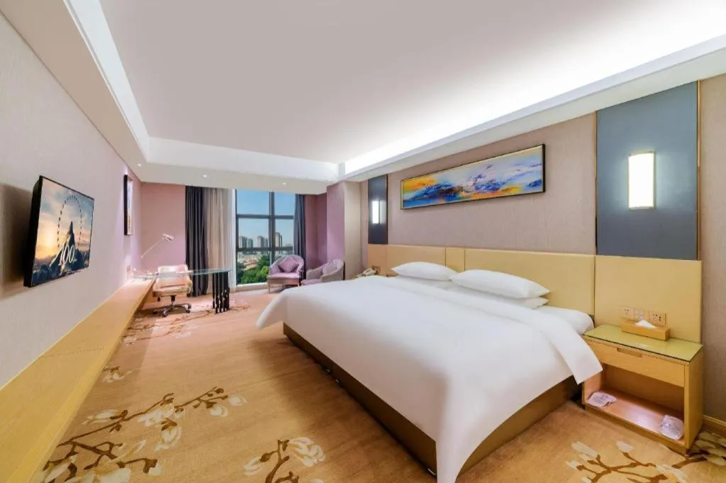 Bed in Vienna Hotel Guangdong Zhongshan Xiaolan High-Speed Railway Station