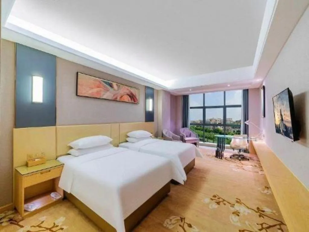 Bed in Vienna Hotel Guangdong Zhongshan Xiaolan High-Speed Railway Station