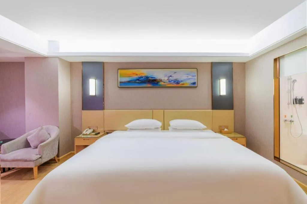 Bed in Vienna Hotel Guangdong Zhongshan Xiaolan High-Speed Railway Station