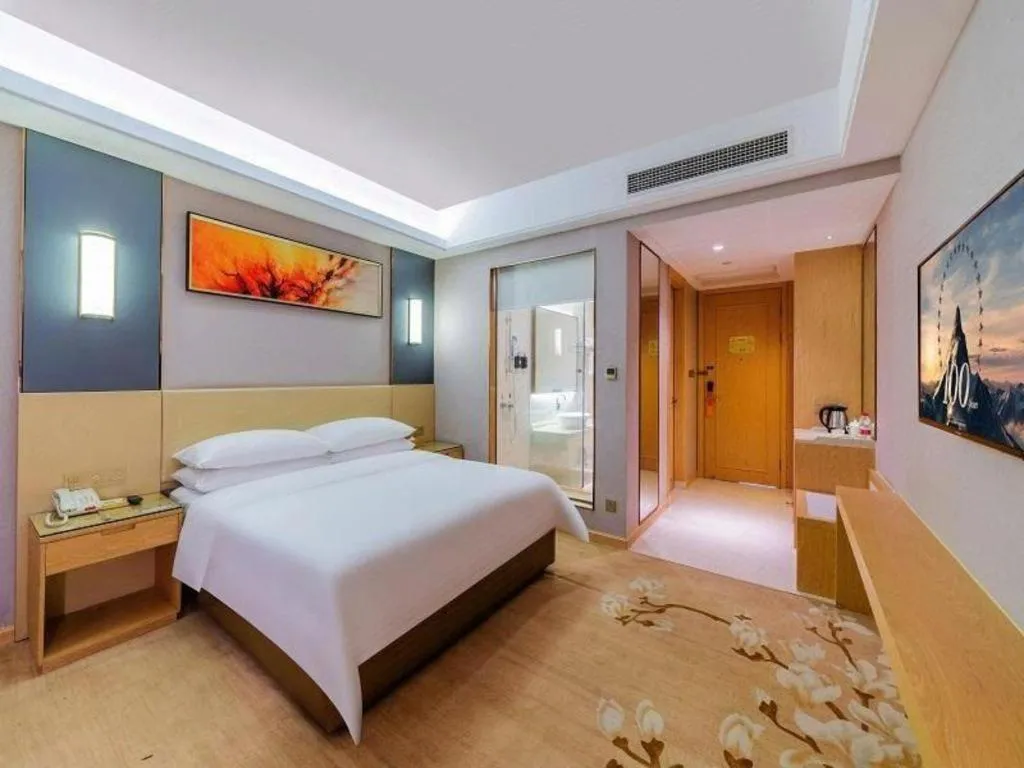 Bed in Vienna Hotel Guangdong Zhongshan Xiaolan High-Speed Railway Station
