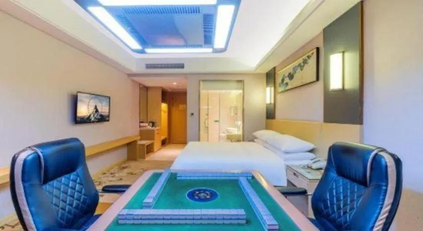 Bed in Vienna Hotel Guangdong Zhongshan Xiaolan High-Speed Railway Station