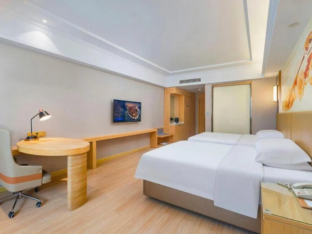 Bed in Vienna Hotel Xuzhou Junsheng Plaza Benteng Avenue Metro Station