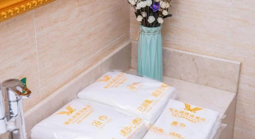 Bed in Vienna Hotel Xuzhou Junsheng Plaza Benteng Avenue Metro Station