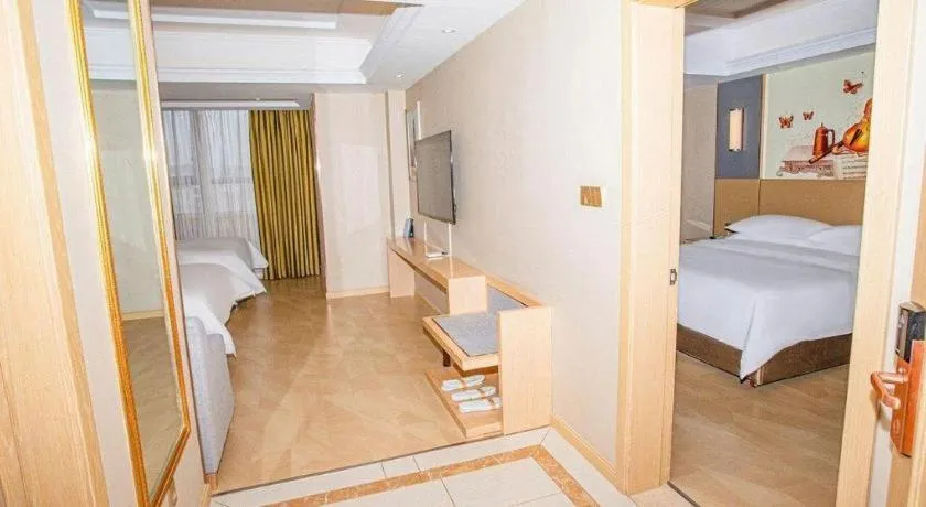 Bed in Vienna Hotel Xuzhou Junsheng Plaza Benteng Avenue Metro Station
