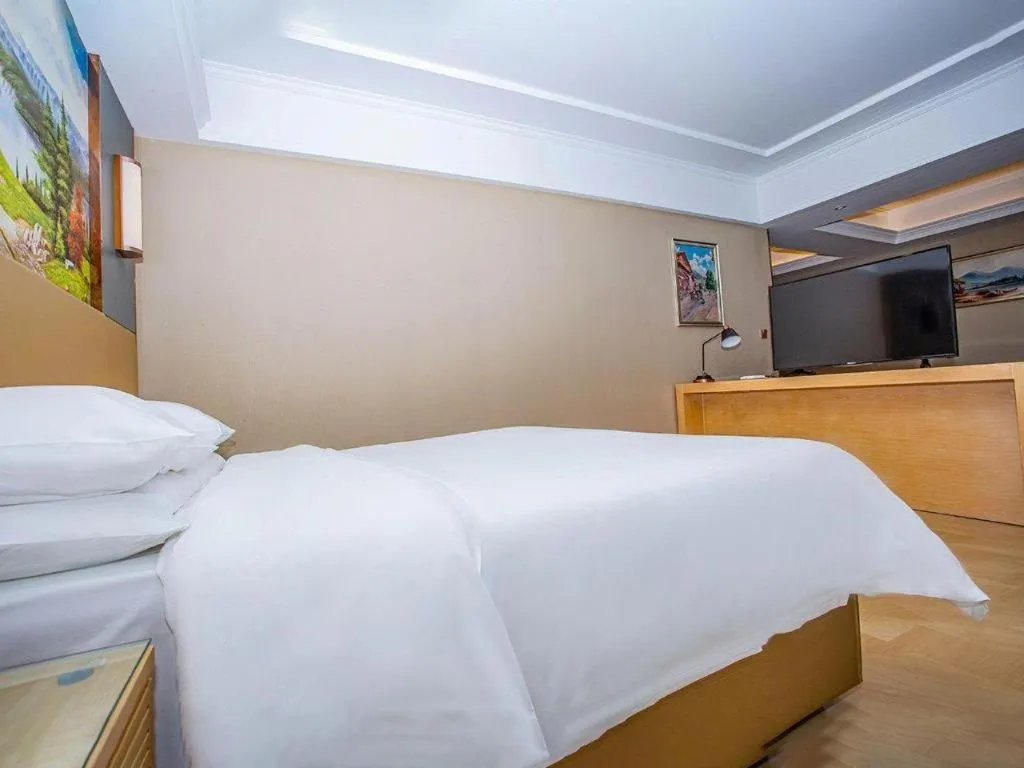 Bed in Vienna Hotel Xuzhou Junsheng Plaza Benteng Avenue Metro Station