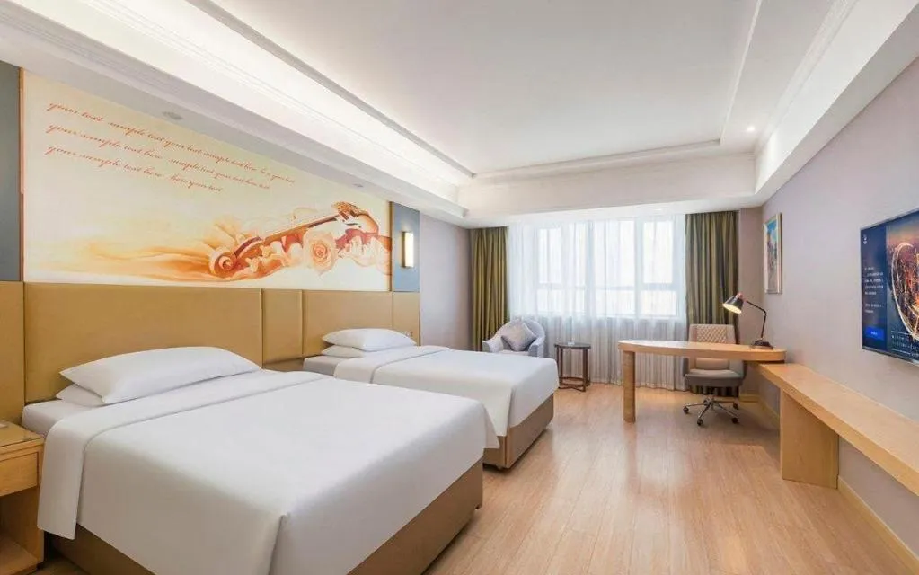Bed in Vienna Hotel Xuzhou Junsheng Plaza Benteng Avenue Metro Station