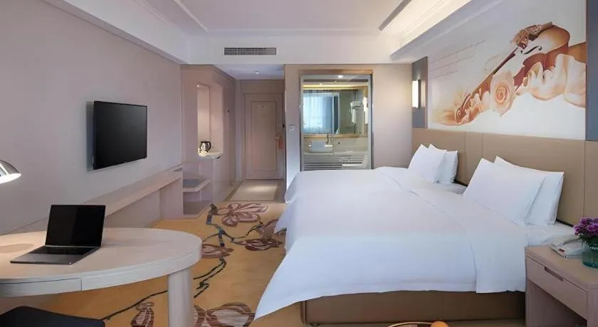 Bed in Vienna Hotel Xuzhou Junsheng Plaza Benteng Avenue Metro Station