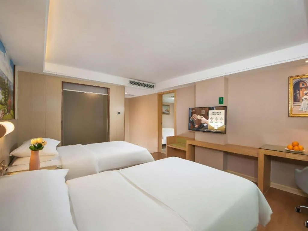 Bed in Venus International Hotel Guangdong Huizhou West Lake