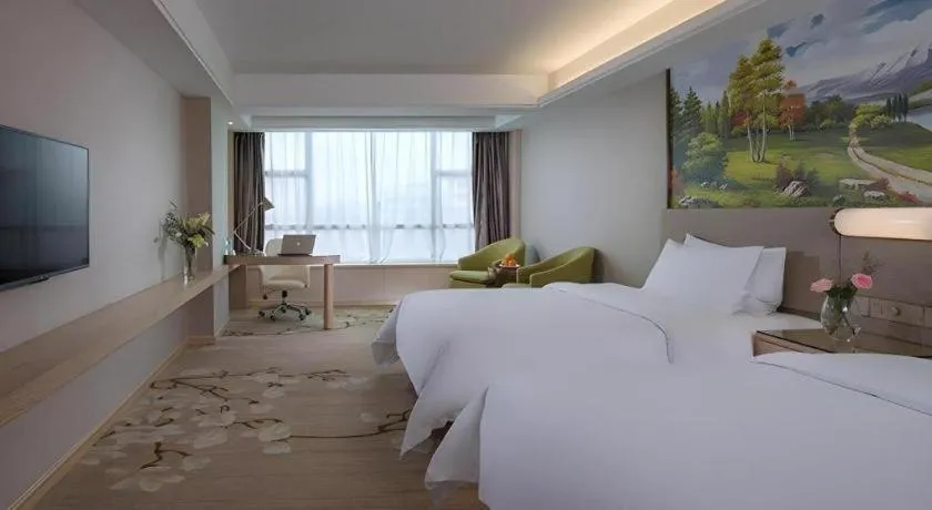 Bed in Venus International Hotel Guangdong Huizhou West Lake