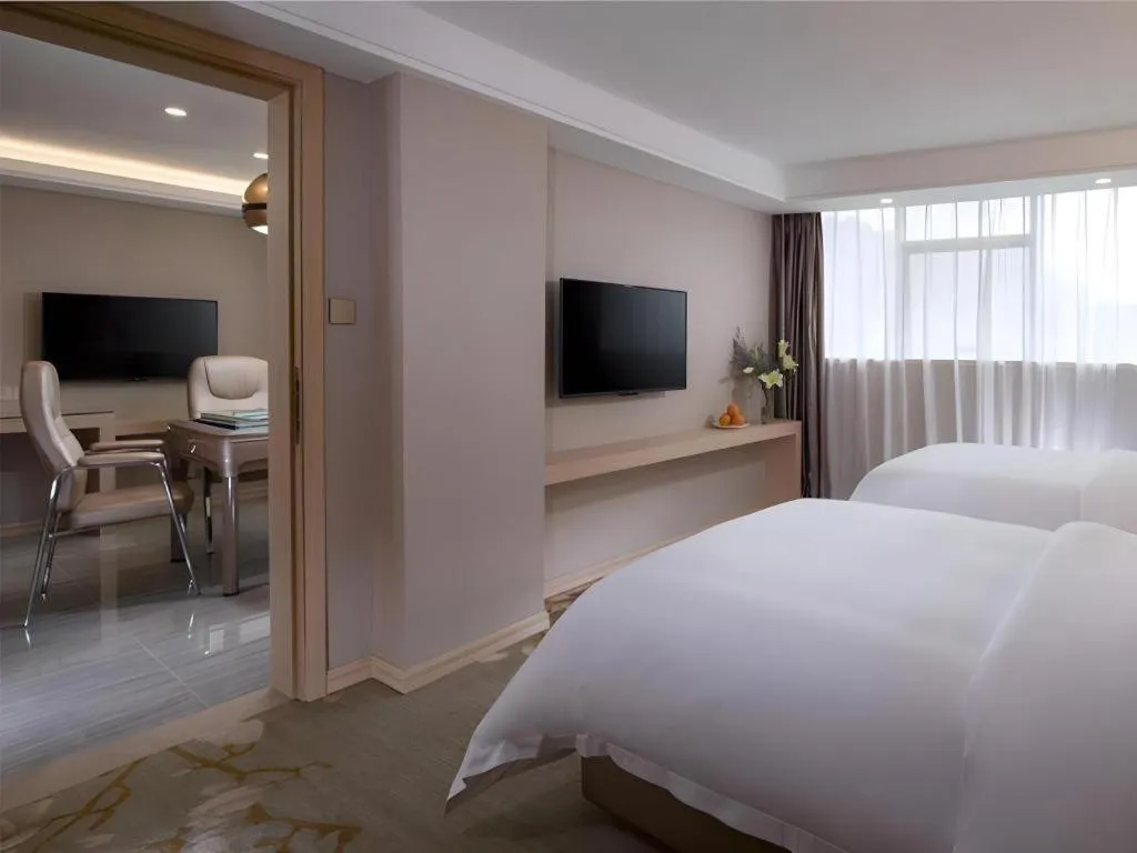 Bed in Venus International Hotel Guangdong Huizhou West Lake