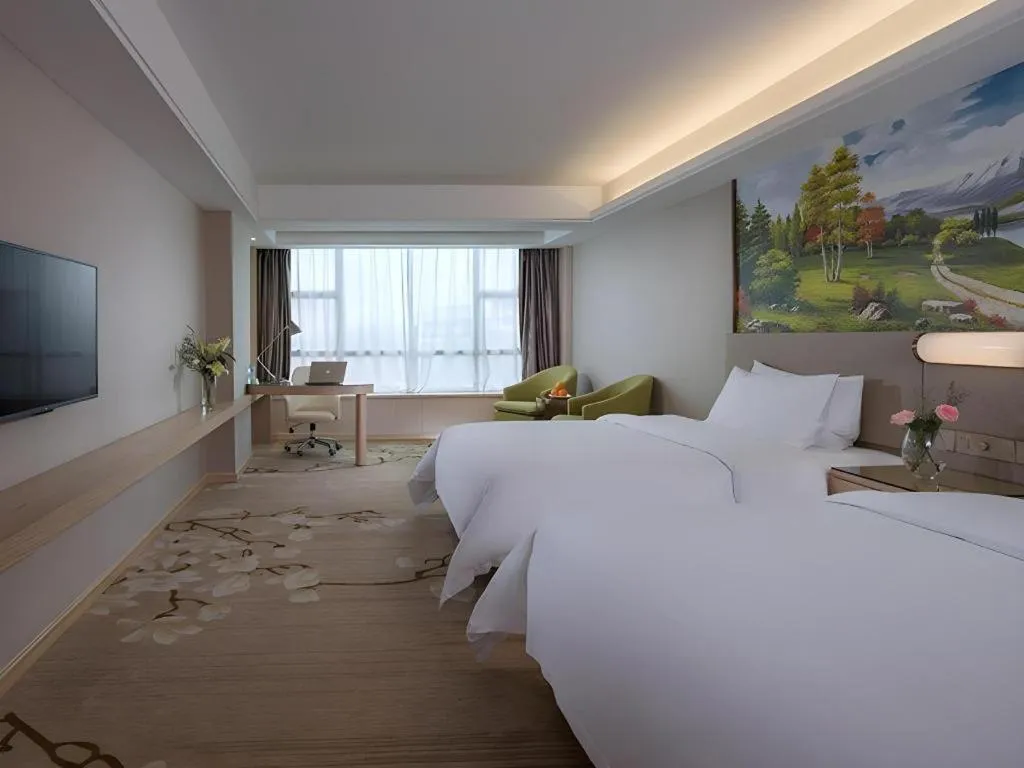 Bed in Venus International Hotel Guangdong Huizhou West Lake
