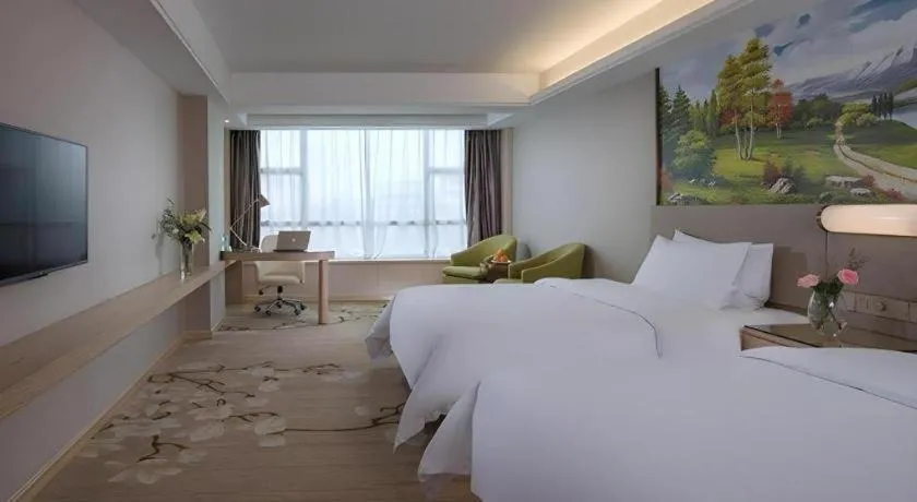 Bed in Venus International Hotel Guangdong Huizhou West Lake