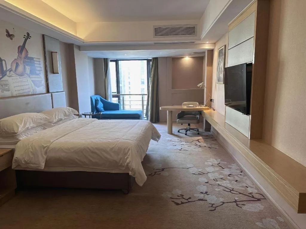 Bed in Vienna Hotel Fuzhou Changle Shouzhan Hangcheng Metro Station