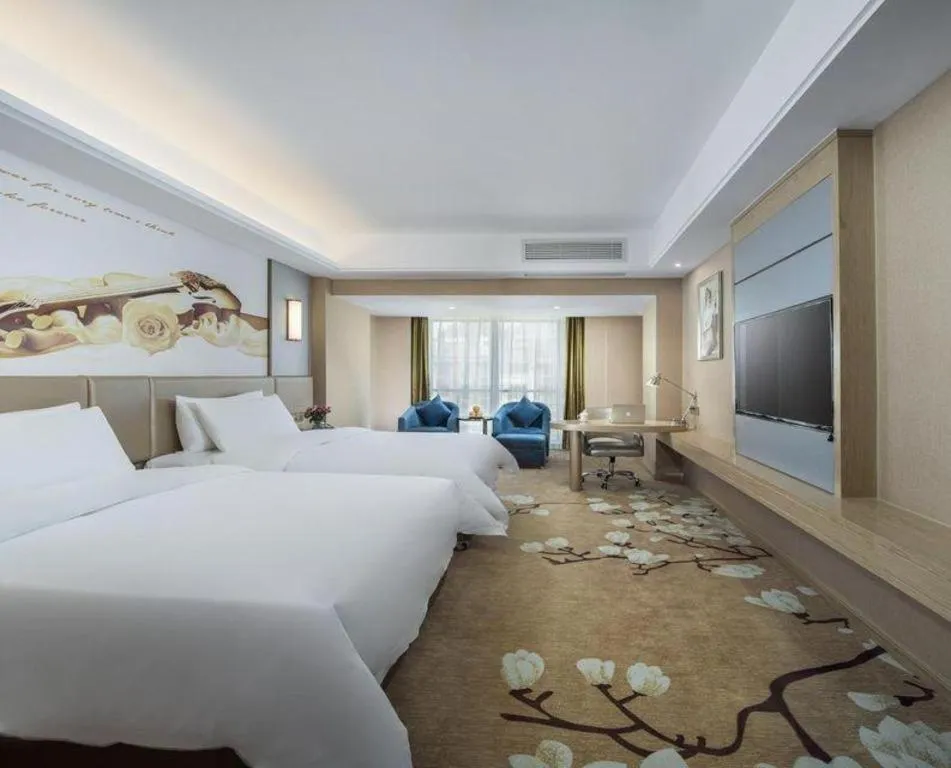 Bed in Vienna Hotel Fuzhou Changle Shouzhan Hangcheng Metro Station