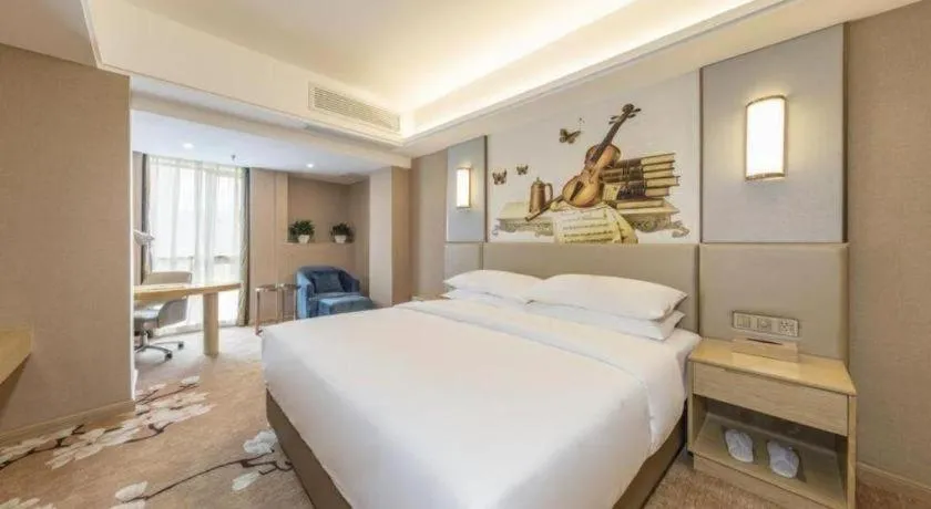 Bed in Vienna Hotel Fuzhou Changle Shouzhan Hangcheng Metro Station