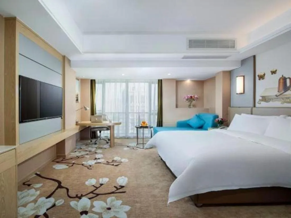 Bed in Vienna Hotel Fuzhou Changle Shouzhan Hangcheng Metro Station