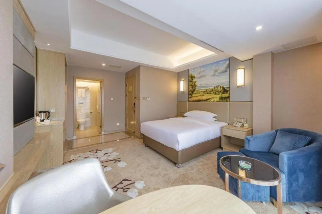 Bed in Vienna Hotel Fuzhou Changle Shouzhan Hangcheng Metro Station