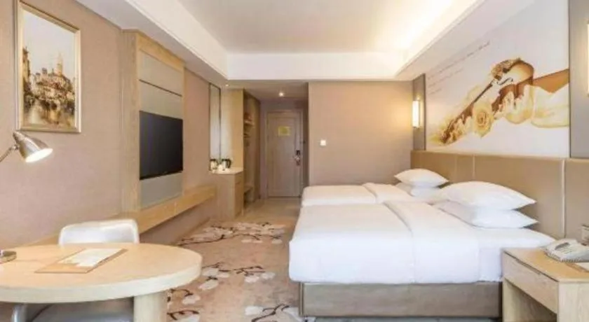 Bed in Vienna Hotel Fuzhou Changle Shouzhan Hangcheng Metro Station