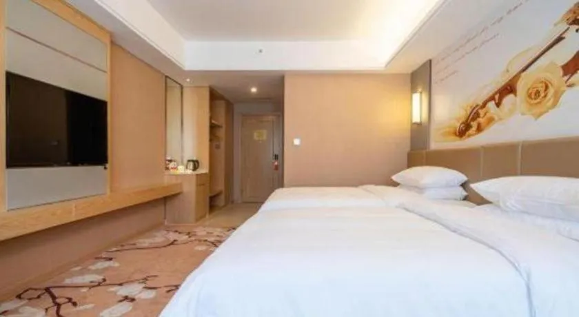 Bed in Vienna Hotel Fuzhou Changle Shouzhan Hangcheng Metro Station