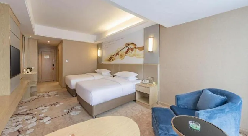 Bed in Vienna Hotel Fuzhou Changle Shouzhan Hangcheng Metro Station