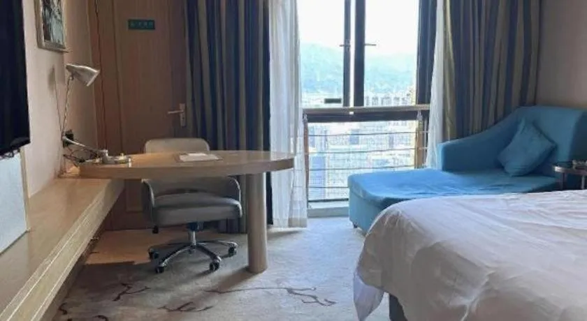 Bed in Vienna Hotel Fuzhou Changle Shouzhan Hangcheng Metro Station