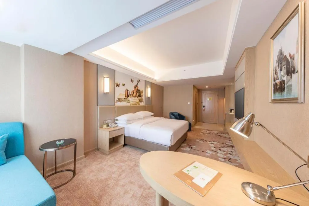 Bed in Vienna Hotel Fuzhou Changle Shouzhan Hangcheng Metro Station