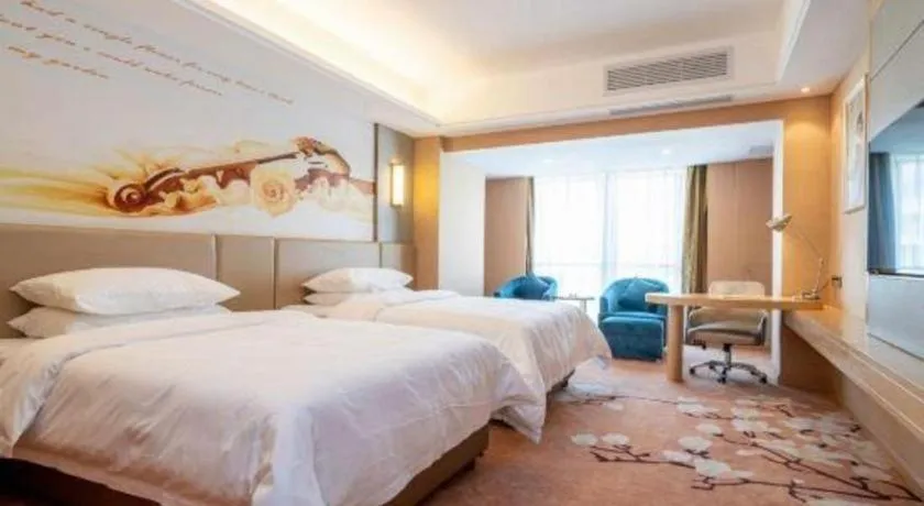 Bed in Vienna Hotel Fuzhou Changle Shouzhan Hangcheng Metro Station