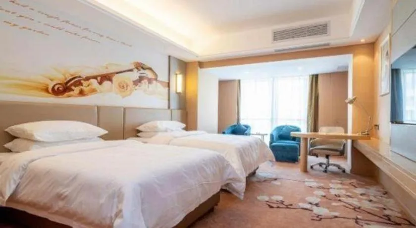 Bed in Vienna Hotel Fuzhou Changle Shouzhan Hangcheng Metro Station