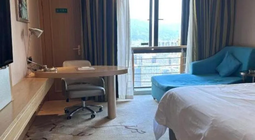 Bed in Vienna Hotel Fuzhou Changle Shouzhan Hangcheng Metro Station