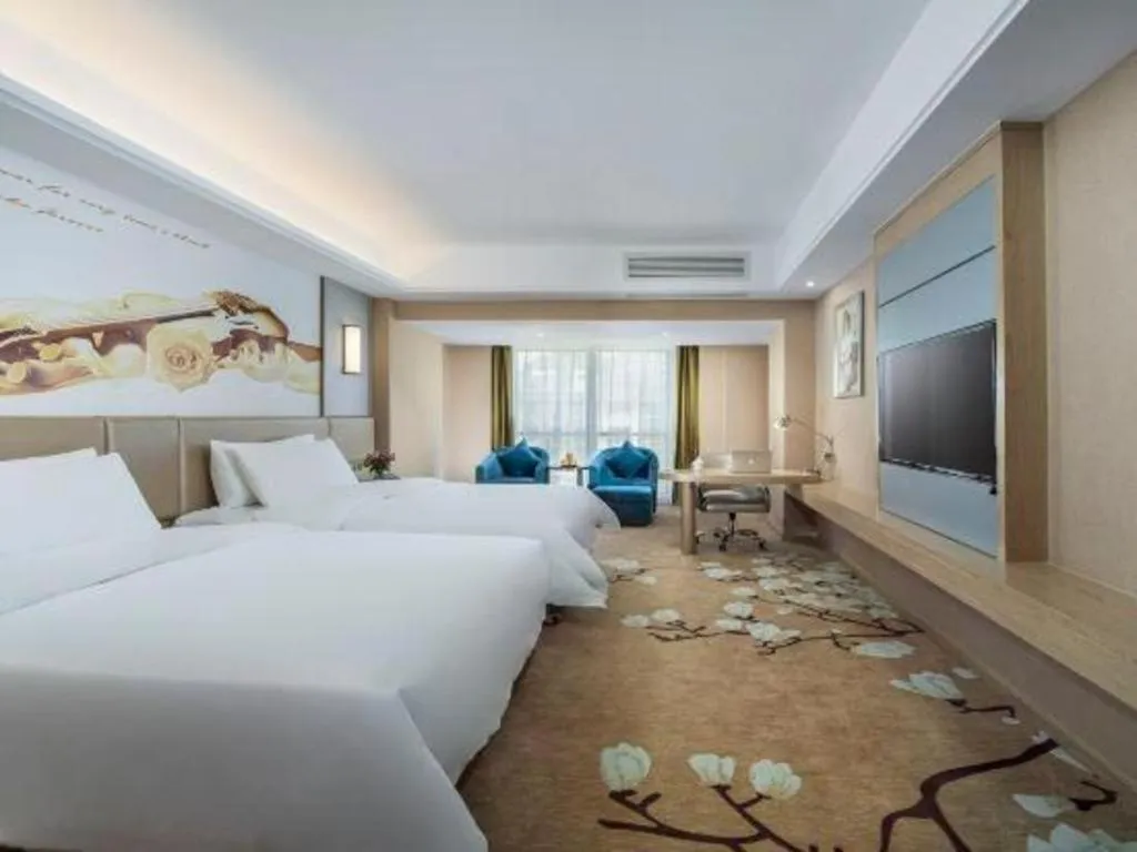 Bed in Vienna Hotel Fuzhou Changle Shouzhan Hangcheng Metro Station