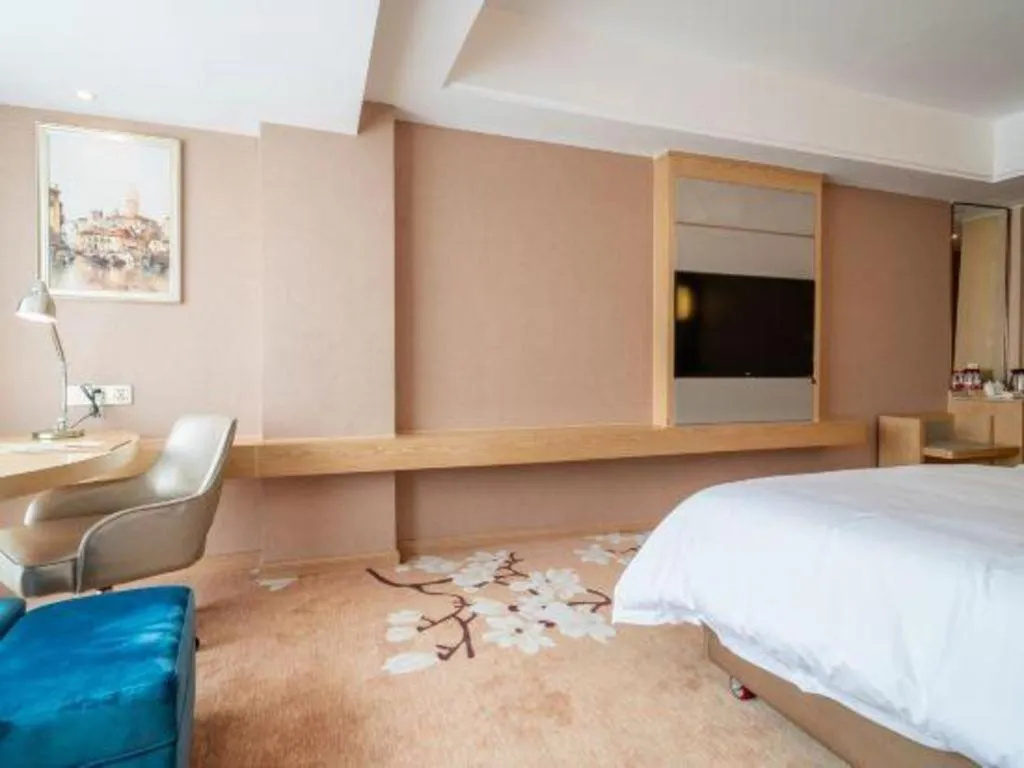 Bed in Vienna Hotel Fuzhou Changle Shouzhan Hangcheng Metro Station