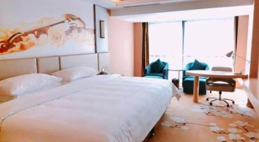 Bed in Vienna Hotel Fuzhou Changle Shouzhan Hangcheng Metro Station