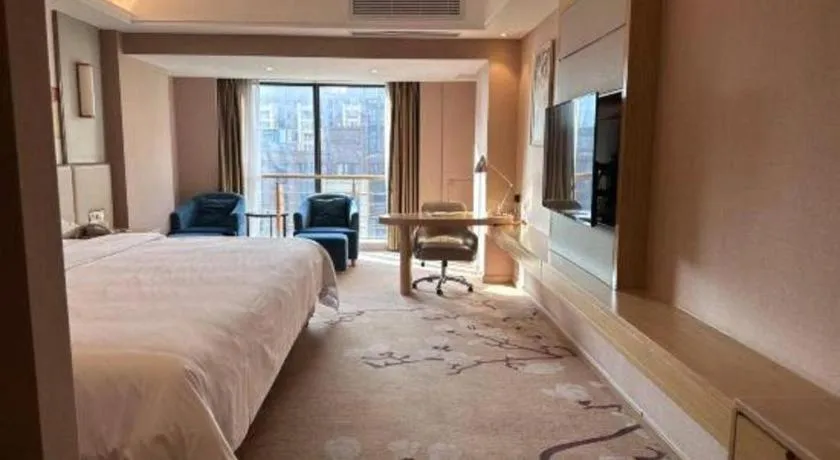 Bed in Vienna Hotel Fuzhou Changle Shouzhan Hangcheng Metro Station