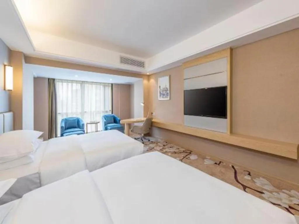 Bed in Vienna Hotel Fuzhou Changle Shouzhan Hangcheng Metro Station