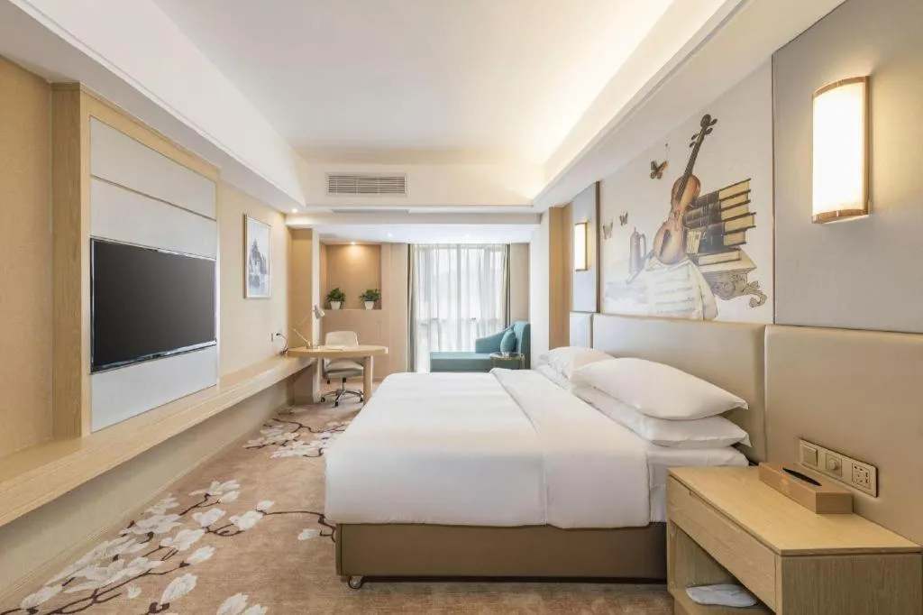 Bed in Vienna Hotel Fuzhou Changle Shouzhan Hangcheng Metro Station