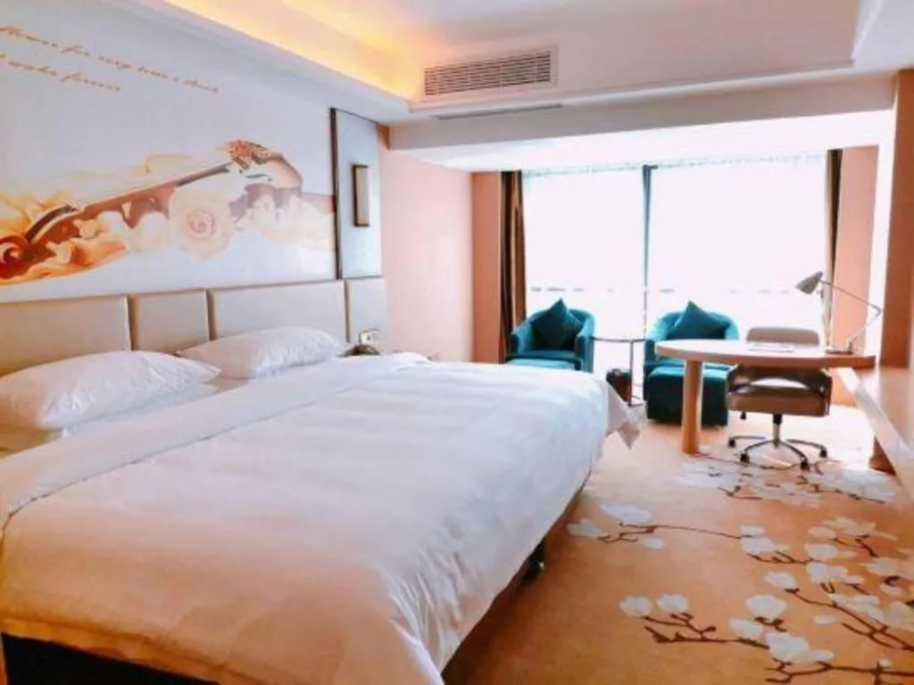 Bed in Vienna Hotel Fuzhou Changle Shouzhan Hangcheng Metro Station