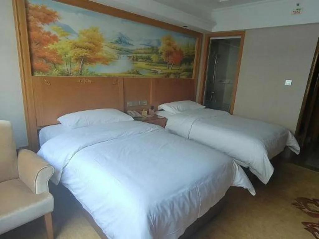 Bed in Vienna Hotel Guangxi Guilin Yongfu Station