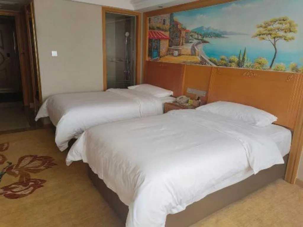 Bed in Vienna Hotel Guangxi Guilin Yongfu Station