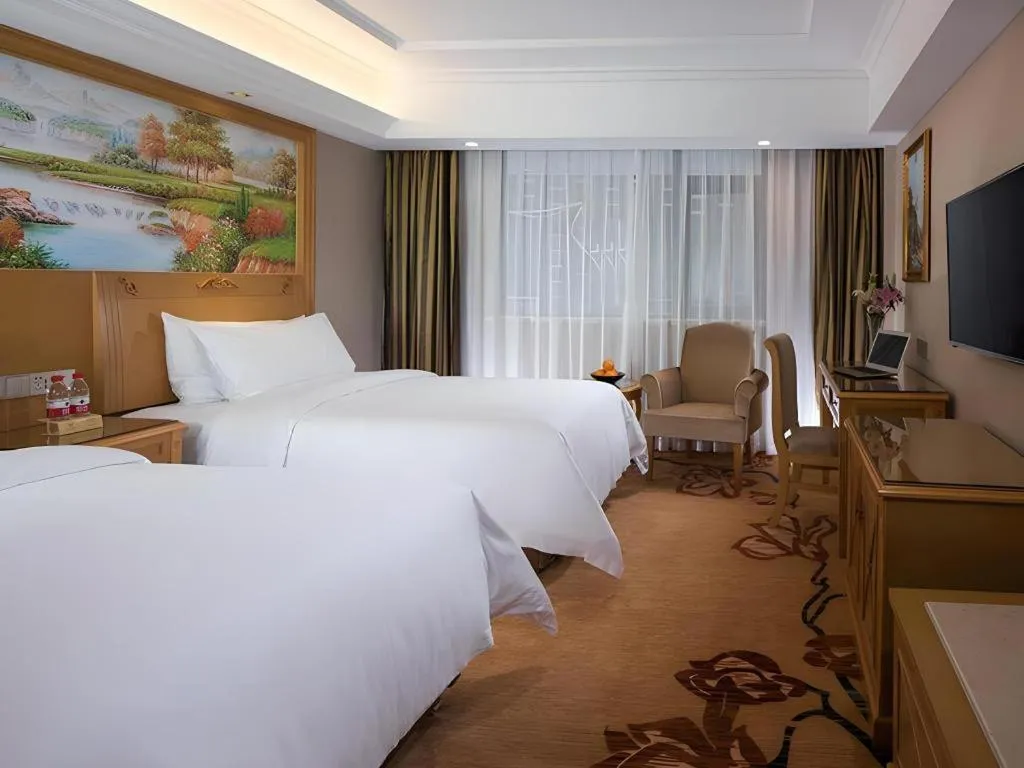 Bed in Vienna Hotel Guangxi Guilin Yongfu Station