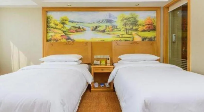 Bed in Vienna Hotel Guangxi Guilin Yongfu Station