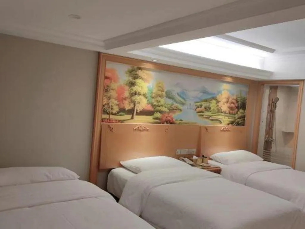 Bed in Vienna Hotel Guangxi Guilin Yongfu Station