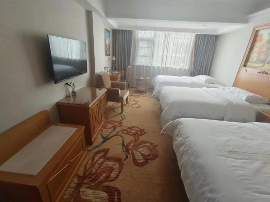 Bed in Vienna Hotel Guangxi Guilin Yongfu Station