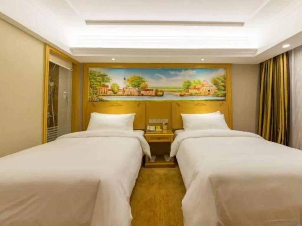 Bed in Vienna Hotel Guangxi Guilin Yongfu Station