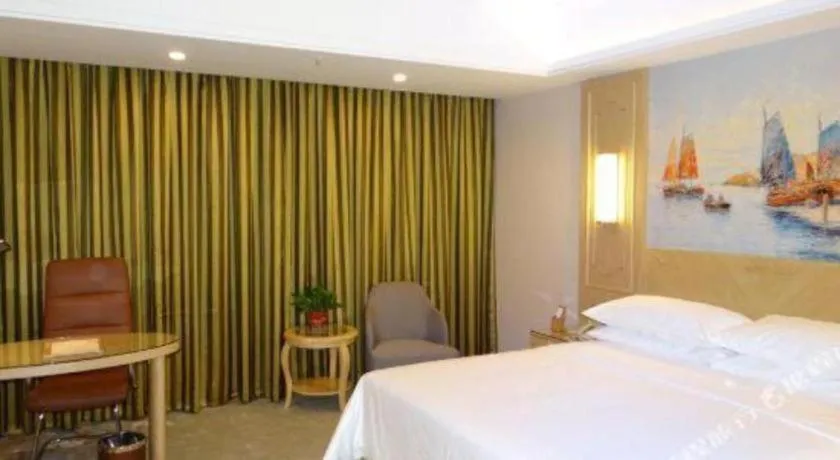 Bed in Vienna Hotel Shandong Dezhou Government Shopping Plaza