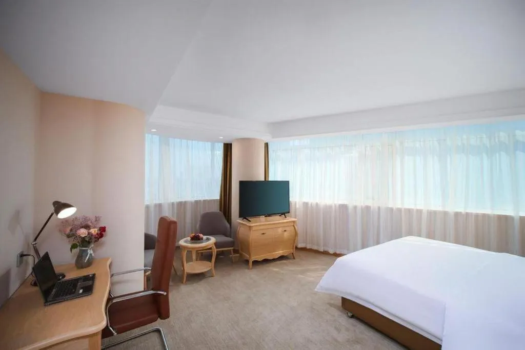 Bed in Vienna Hotel Shandong Dezhou Government Shopping Plaza