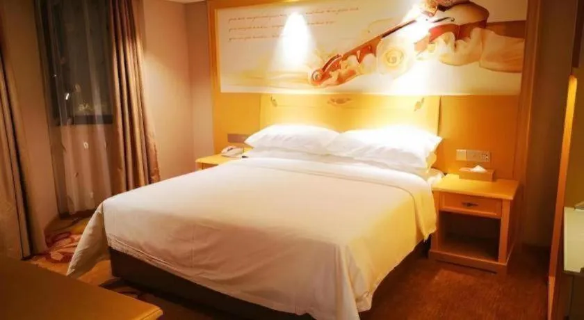 Bed in Vienna Hotel Guangxi Hezhou Guposhan Suifeng