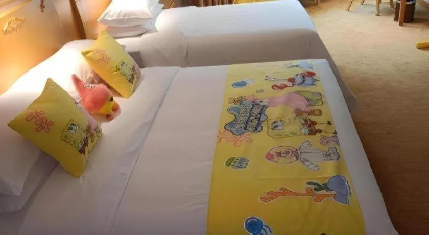 Bed in Vienna Hotel Guangxi Hezhou Guposhan Suifeng